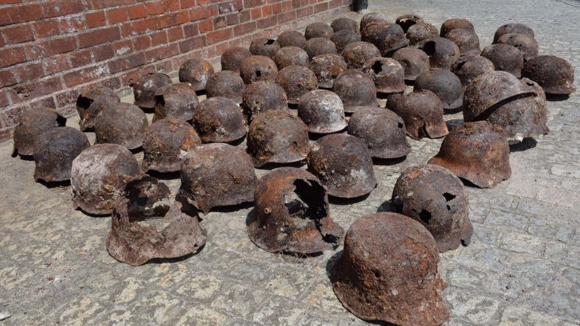 Over 50 Military Helmets from World Wars Discovered During Roadworks in Poland