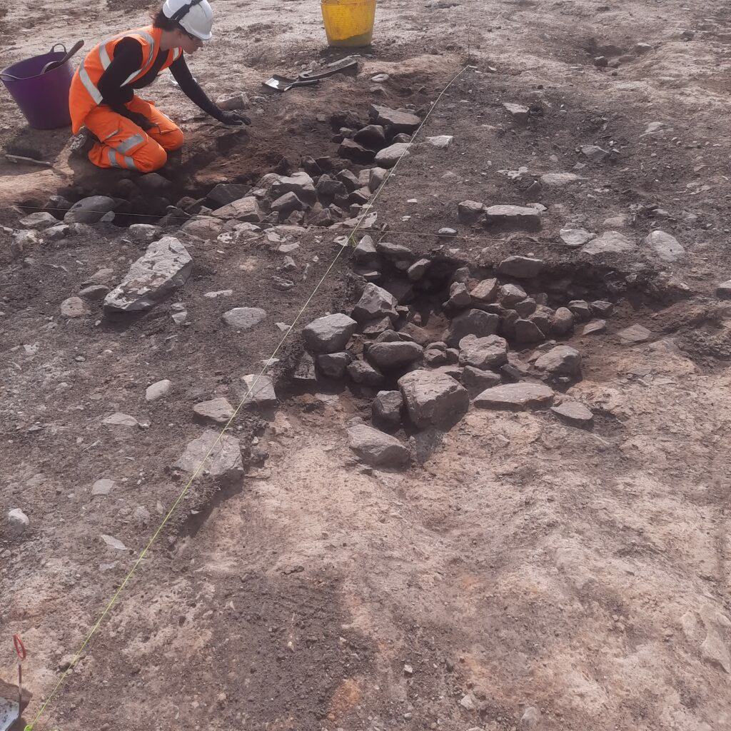 Bronze Age Burial Unearthed in England: Human Ashes, Urn and Volcanic Stone Axe