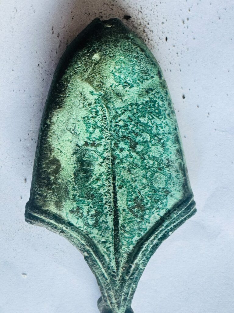 Complete decorated 11th-century sword-scabbard chape discovered in Poland’s Masovian Voivodeship.