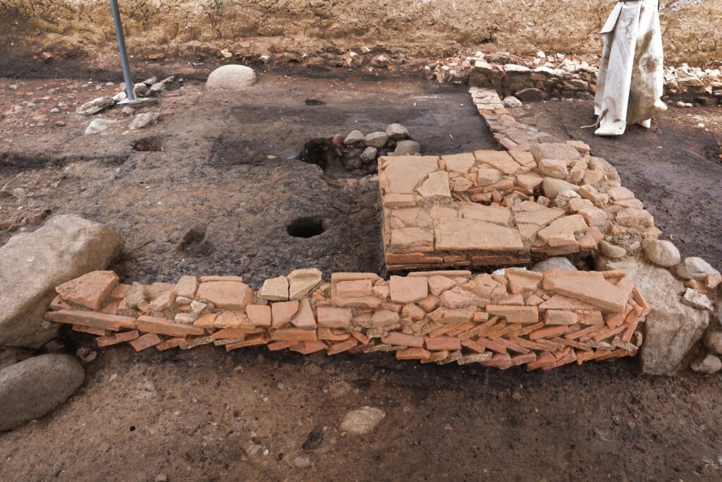 Platform made from reused Roman bricks and tiles in the portico at Ligornetto