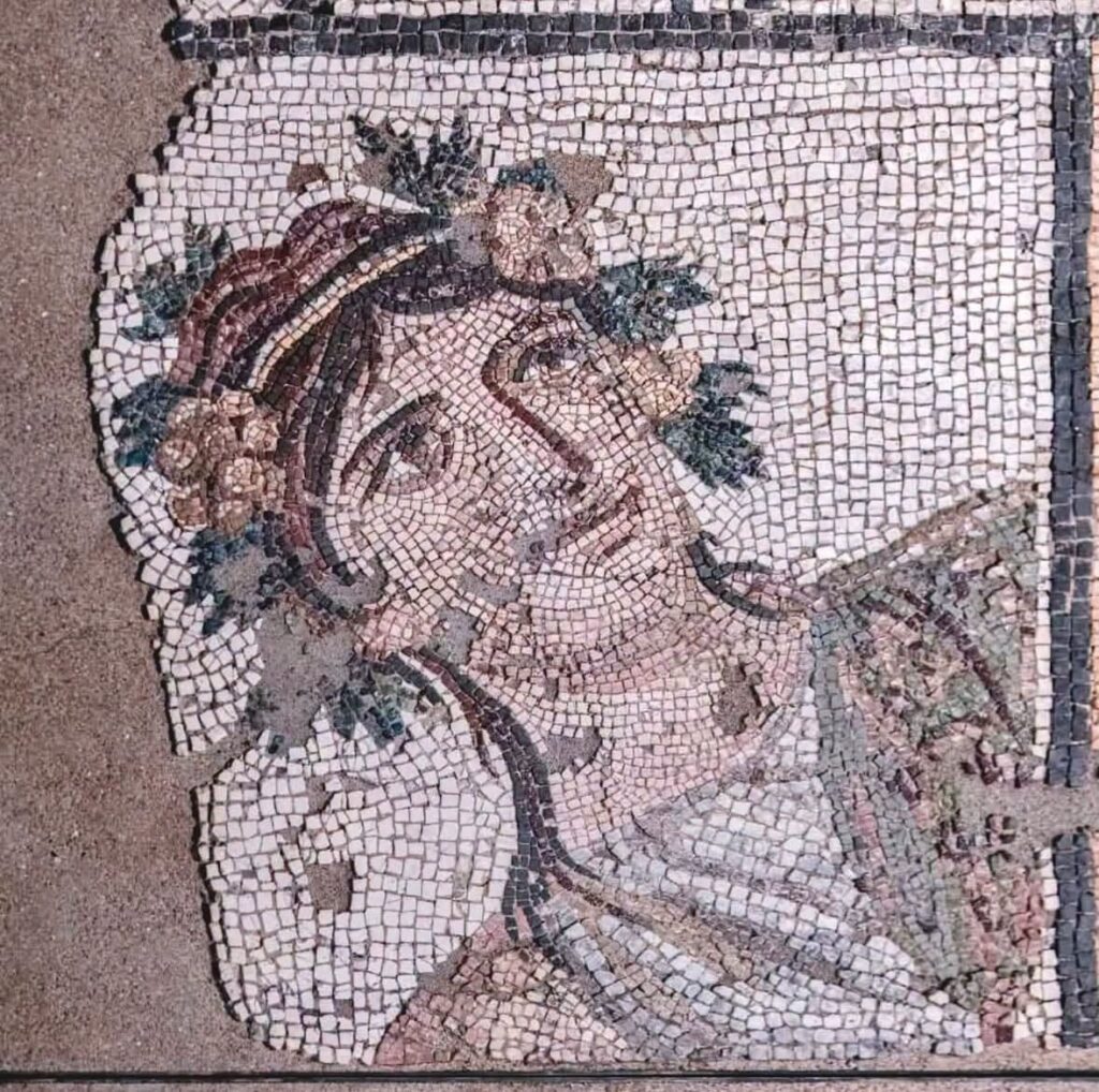 Female seasonal figure decorating a corner of the Proserpina abduction mosaic