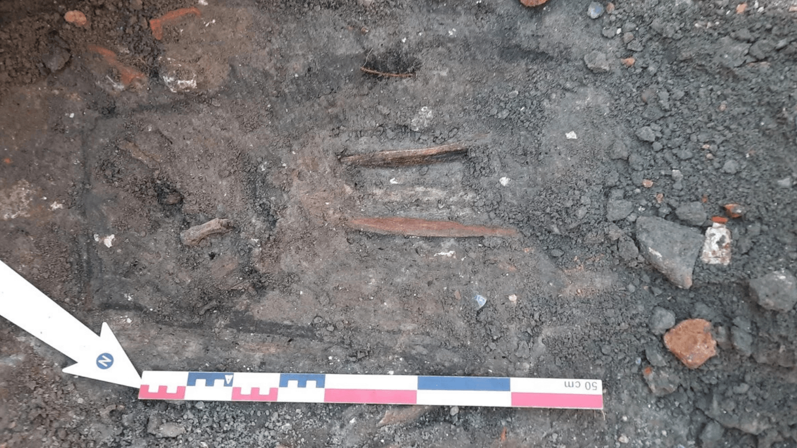 Archaeologists Open a Small Test Pit in Ghent and Find Five Layers of Medieval Burials