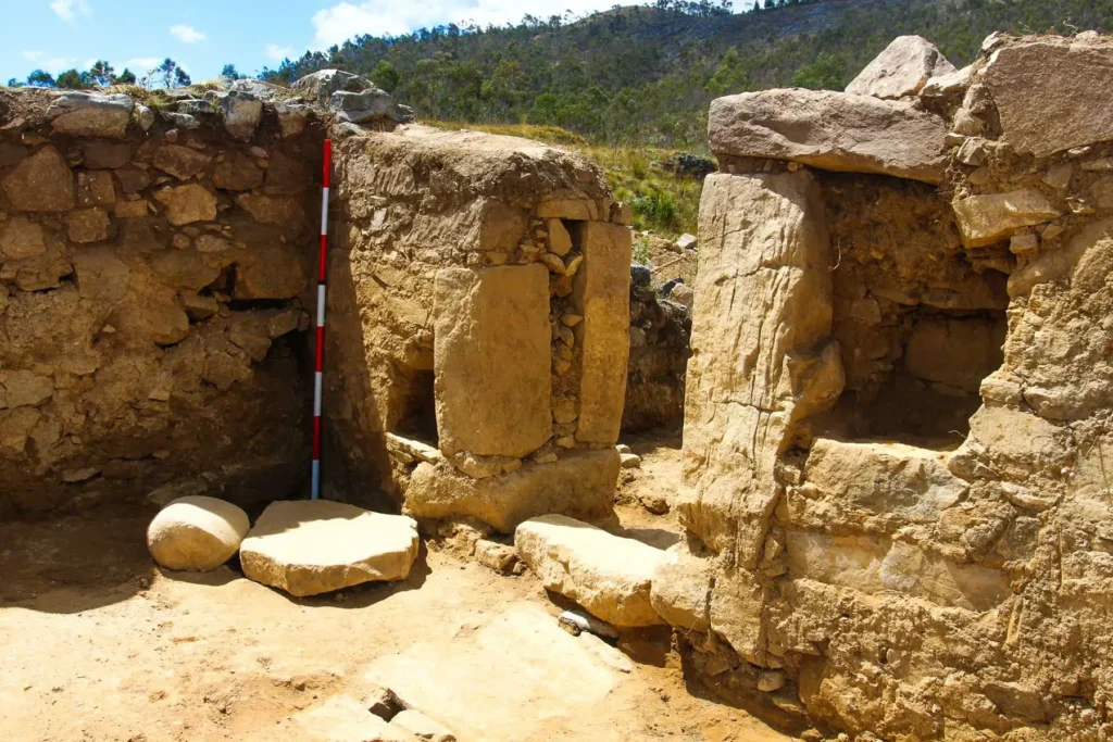 Excavated stone walls and entrances in Sector C of the Wancasanga archaeological site in Peru.