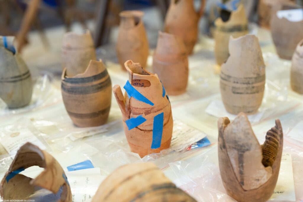 Fragmentary prehistoric pottery vessels undergoing study after their discovery at Liman Tepe.