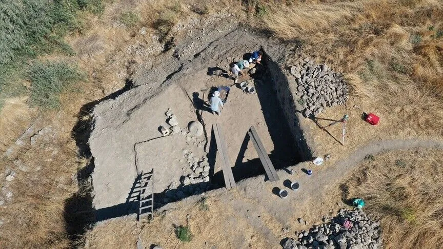 Archaeologists working inside a deep excavation trench at Maydos Kilisetepe.