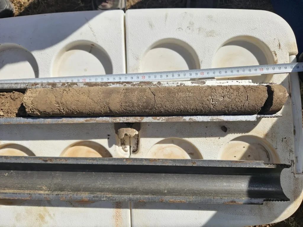 Soil core sample beside a measuring tape during the Durupınar investigation.