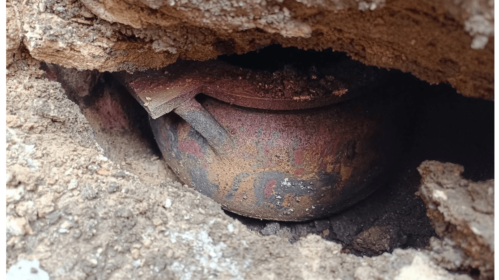 Rare 2,600-Year-Old Cube-Shaped Tomb in Italy Held Cremated Remains Inside a Greek Wine Vessel