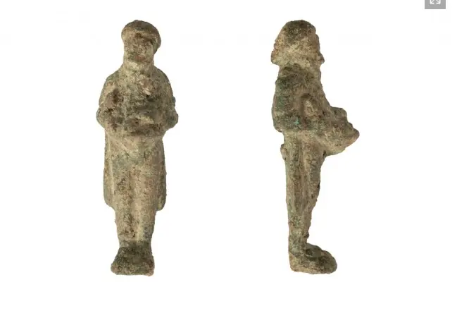 Front and side views of the bronze Priapus figurine discovered at Novae.