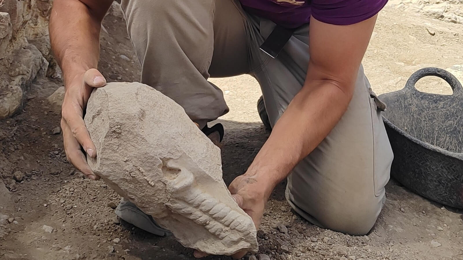 2,400-Year-Old Iberian Statue Head Found Built Into a Roman Granary in Spain
