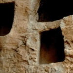 Rock-cut burial niches in Iran with a newly identified Sasanian Pahlavi inscription marked in yellow.