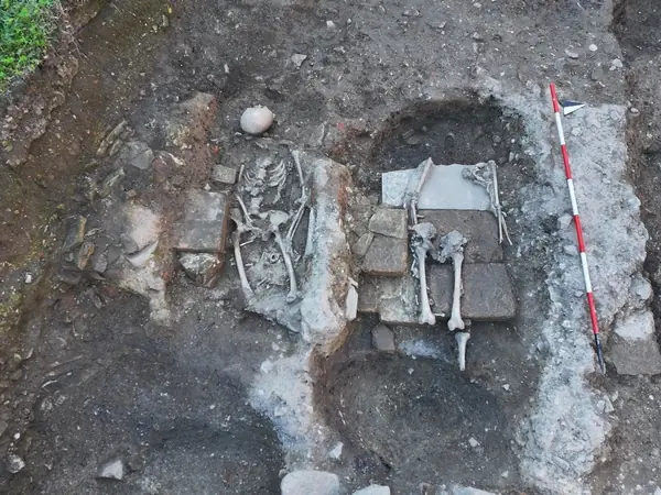 Human skeletal remains uncovered in brick-lined graves at the early Christian archaeological site of Altinum, Italy.