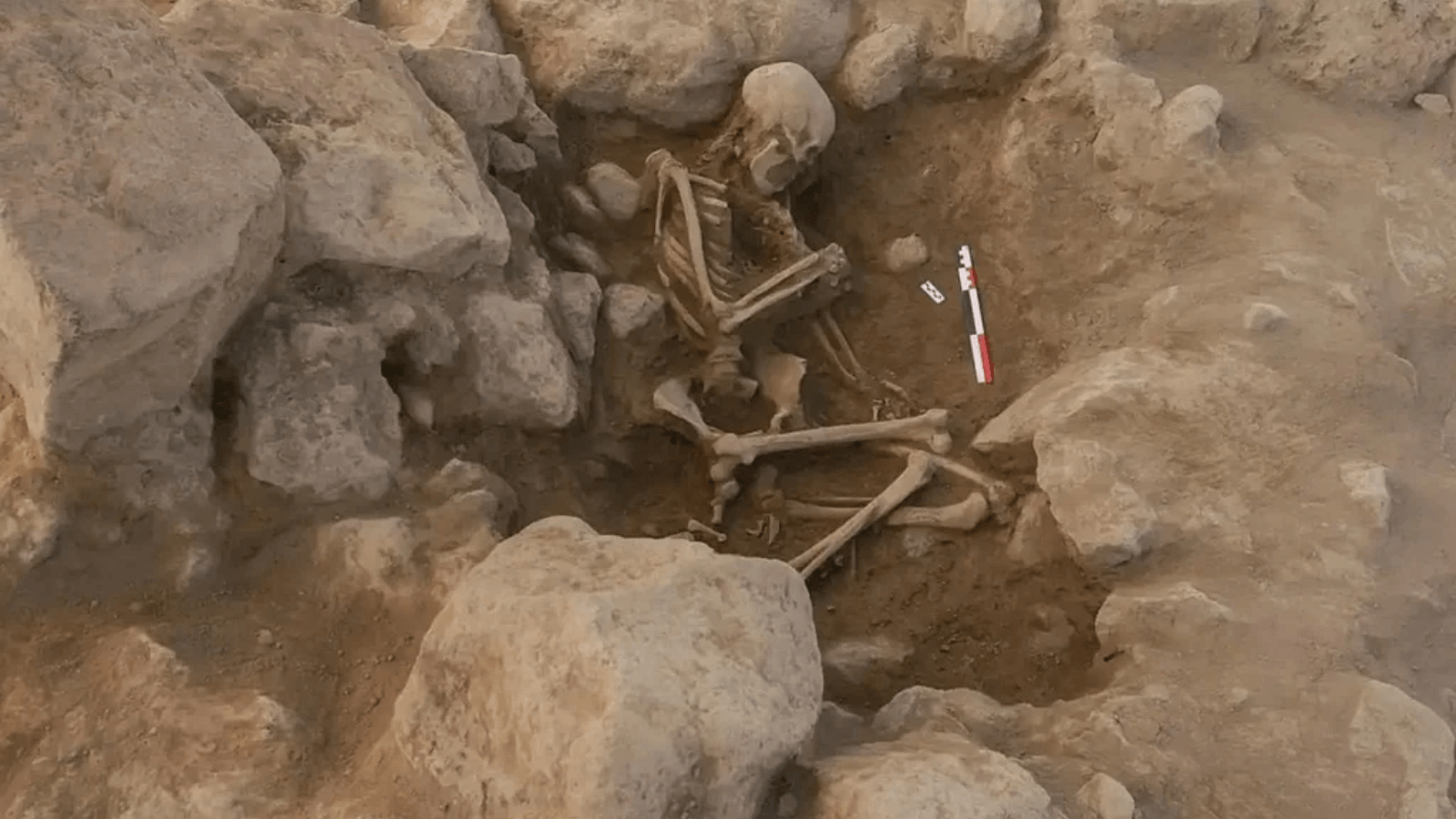 Archaeological burial of a 2,700-year-old woman surrounded by stones at the ancient settlement of Metsamor in Armenia.