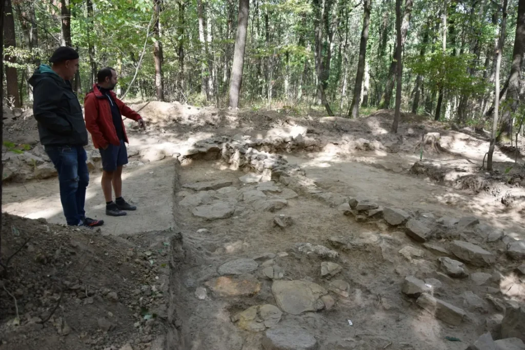 Archaeologist excavating Building E at the Roman settlement of Pilisszentiván–Hárs-erdő.