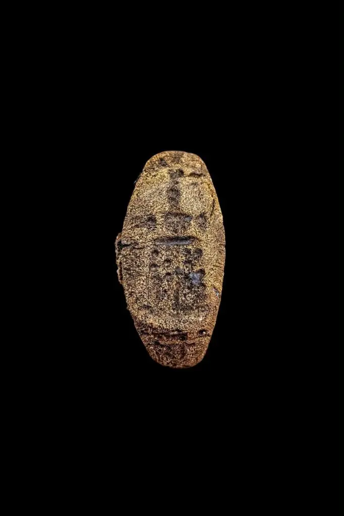 Engraved image of the Lighthouse of Alexandria on an ancient bronze signet ring.