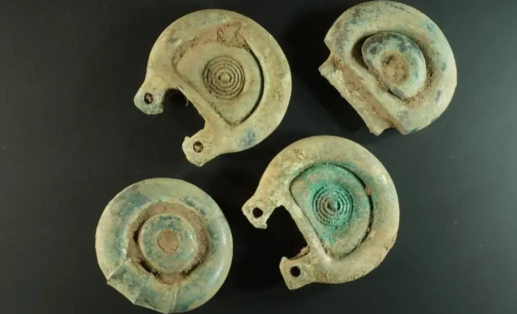 Decorated bronze fittings from the Peebles Hoard in Scotland.