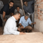 Egyptian officials and archaeologists inside the newly discovered Old Kingdom tomb of Weni at Saqqara.